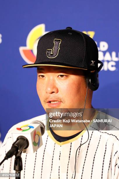 Yoshitomo Tsutsugoh of Japan speaks during a training session ahead of the World Baseball Classic Championship Round at Dodger Stadium on March 20,...