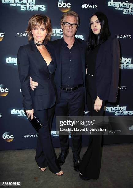 Actors Lisa Rinna and Harry Hamlin and daughter Amelia Gray Hamlin attend "Dancing with the Stars" Season 24 premiere at CBS Televison City on March...