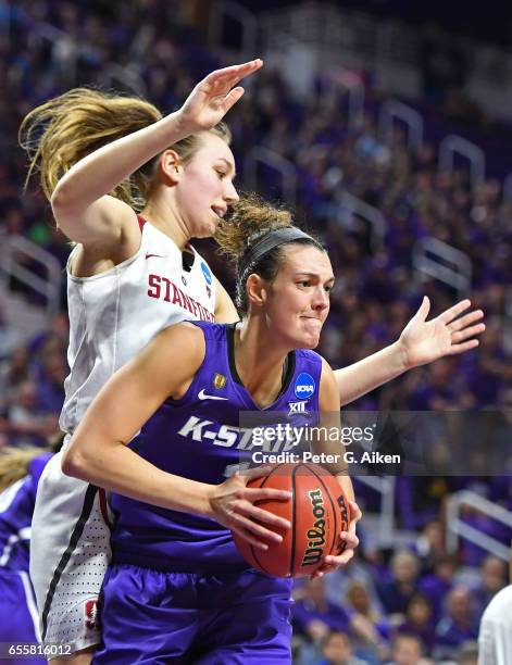 Kaylee Page of the Kansas State Wildcats grabs a rebound against Alanna Smith of the Stanford Cardinal during the second round of the 2017 NCAA...