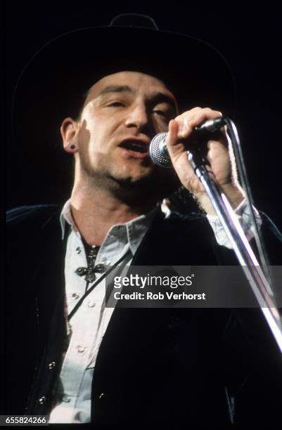 Bono of U2 performs on stage on LoveTown Tour, Ahoy, Rotterdam, Netherlands, 7th January 1990.