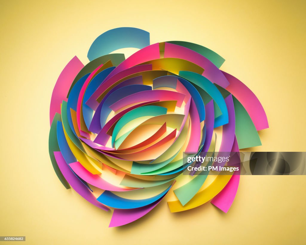 Multi colored sheets of paper in circular pattern