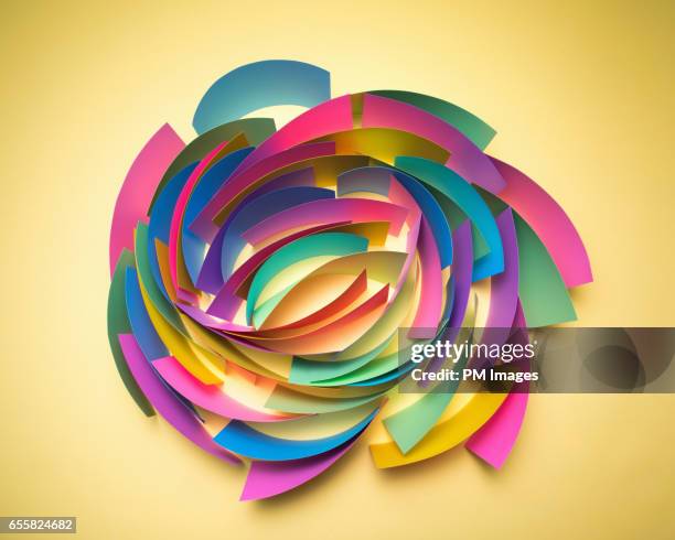 Multi colored sheets of paper in circular pattern