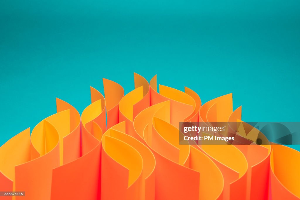 Waves of sheets of paper that mimic fire