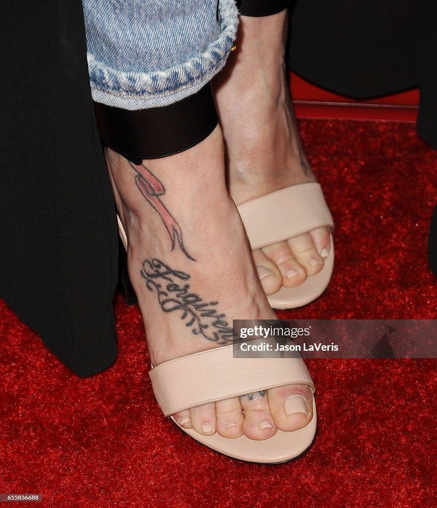 Tish Cyrus, shoe and tattoo detail, attends the 2017 NBCUniversal... News  Photo - Getty Images