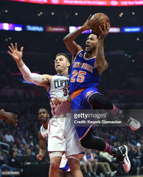 Derrick Rose of the New York Knicks goes for a basket against Blake Griffin of the Los Angeles Clippers during the first half of the basketball game...