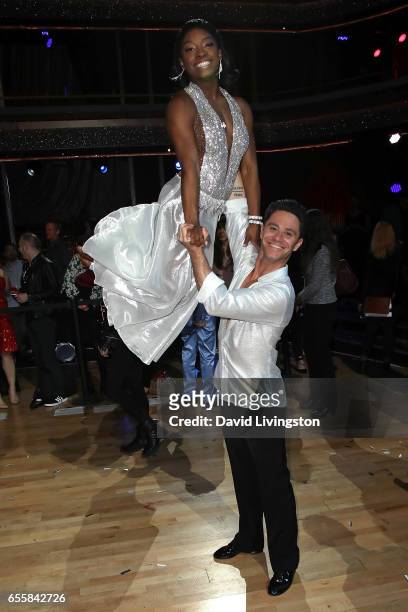 Olympian Simone Biles and dancer Sasha Farber attend "Dancing with the Stars" Season 24 premiere at CBS Televison City on March 20, 2017 in Los...
