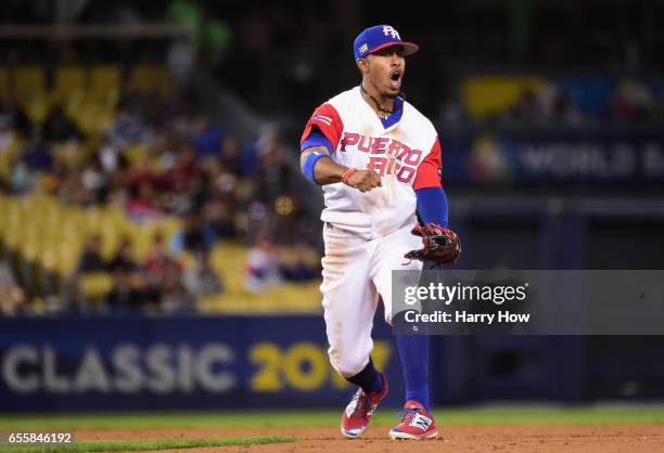 Francisco Lindor of the Puerto Rico celebrates a double play against the Netherlands in the seventh inning during Game 1 of the Championship Round of...