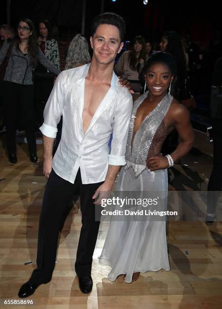 Olympian Simone Biles and dancer Sasha Farber attend "Dancing with the Stars" Season 24 premiere at CBS Televison City on March 20, 2017 in Los...