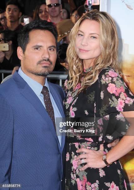 Actor Michael Pena and wife Brie Shaffer arrive at the premiere of Warner Bros. Pictures' 'CHiPS' at TCL Chinese Theatre on March 20, 2017 in...