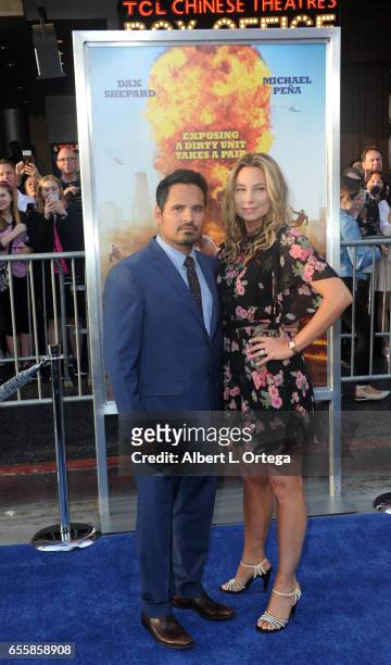 Actor Michael Peña and wife Brie Shaffer arrive for the premiere of Warner Bros. Pictures' "CHiPS" held at TCL Chinese Theatre on March 20, 2017 in...