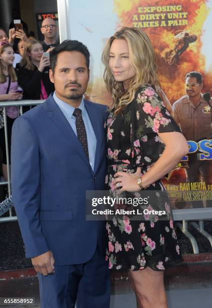 Actor Michael Peña and wife Brie Shaffer arrive for the premiere of Warner Bros. Pictures' "CHiPS" held at TCL Chinese Theatre on March 20, 2017 in...