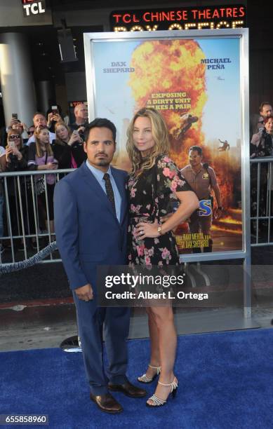 Actor Michael Peña and wife Brie Shaffer arrive for the premiere of Warner Bros. Pictures' "CHiPS" held at TCL Chinese Theatre on March 20, 2017 in...