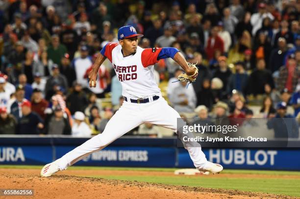 Pitcher Edwin Diaz of the Puerto Rico pitches in the ninth inning against team Netherlands during Game 1 of the Championship Round of the 2017 World...