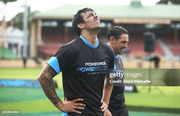 Mitchell Johnson and Billy Slater take part in the endurance test during the Powerade Powerscore Launch Event at North Sydney Oval on March 21, 2017...