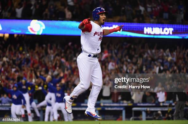 Eddie Rosario of the Puerto Rico celebrates their 4-3 win over team Netherlands in an 11-inning Game 1 of the Championship Round of the 2017 World...