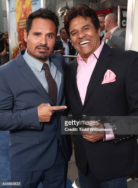 Michael Pena and Erik Estrada attend the premiere of Warner Bros. Pictures' "CHiPS" at TCL Chinese Theatre on March 20, 2017 in Hollywood, California.