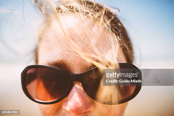 woman with sunglasses. - longeville sur mer stock pictures, royalty-free photos & images