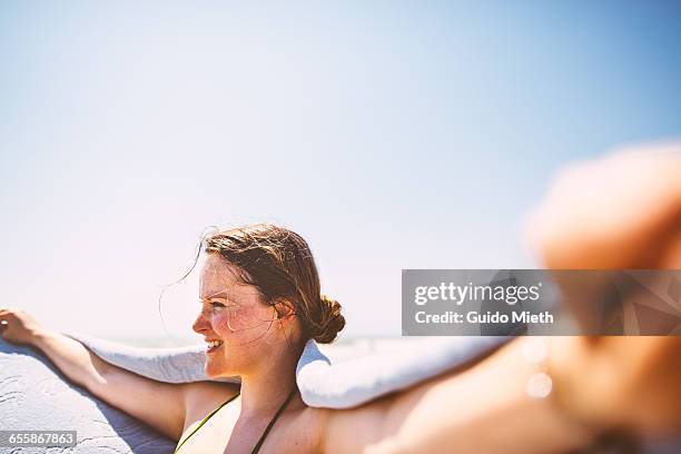 happy woman on the beach. - longeville sur mer stock pictures, royalty-free photos & images