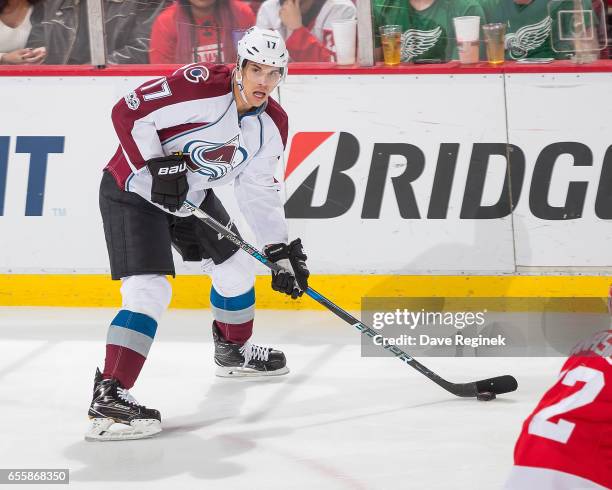 Rene Bourque of the Colorado Avalanche looks to pass the puck against the Detroit Red Wings during an NHL game at Joe Louis Arena on March 18, 2017...