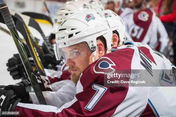 John Mitchell of the Colorado Avalanche watches the action from the bench during an NHL game against the Detroit Red Wings at Joe Louis Arena on...