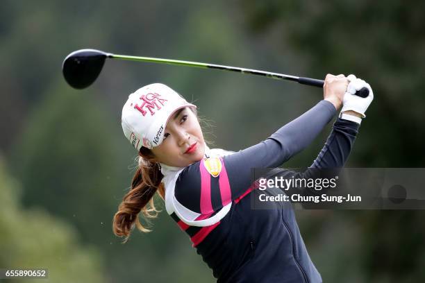 Bo-Mee Lee of South Korea plays a tee shot on 5th hole in the final round during the T-Point Ladies Golf Tournament at the Wakagi Golf Club on March...