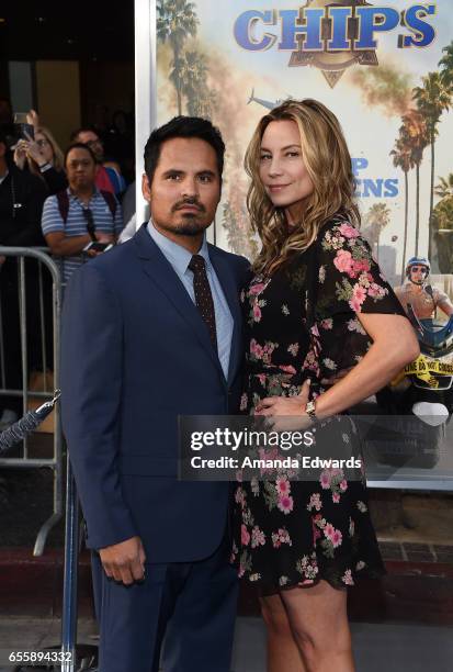 Actor Michael Pena and Brie Shaffer arrive at the premiere of Warner Bros. Pictures' "CHiPS" at the TCL Chinese Theatre on March 20, 2017 in...