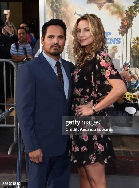 Actor Michael Pena and Brie Shaffer arrive at the premiere of Warner Bros. Pictures' "CHiPS" at the TCL Chinese Theatre on March 20, 2017 in...