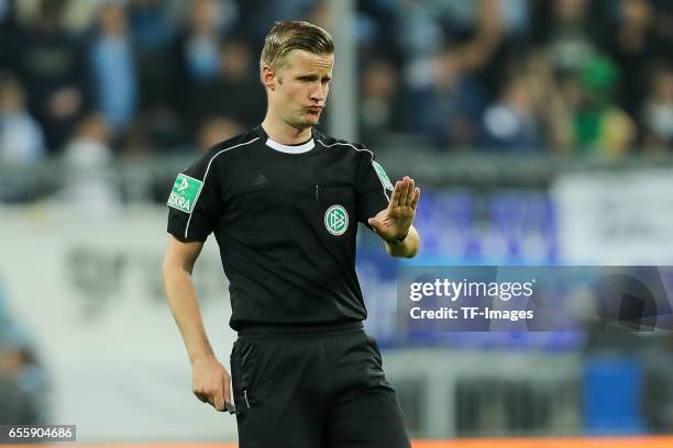 Referee Arne Aarnink gestures during the Second Bundesliga match between TSV 1860 Muenchen and FC Wuerzburger Kickers at Allianz Arena on March 17,...