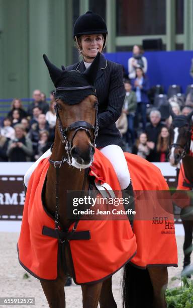 Edwina Tops-Alexander of Australia riding California celebrates winning the Grand Prix Hermes CSI5 show jumping event on day three of the Saut Hermes...