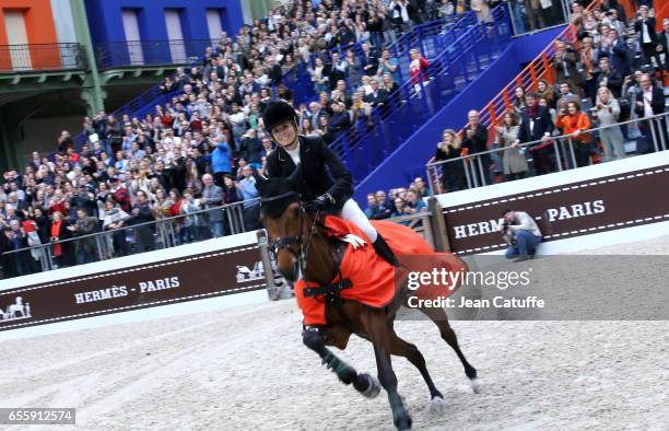 Edwina Tops-Alexander of Australia riding California celebrates winning the Grand Prix Hermes CSI5 show jumping event on day three of the Saut Hermes...