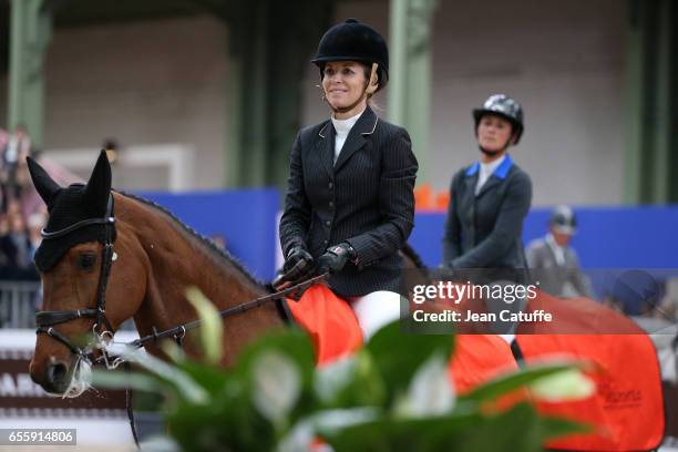 Edwina Tops-Alexander of Australia riding California celebrates winning the Grand Prix Hermes CSI5 show jumping event on day three of the Saut Hermes...