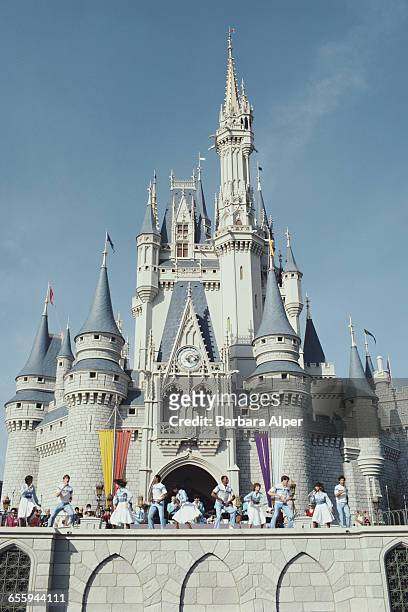 Show outside the Cinderella Castle at Walt Disney World, Florida, 1980.