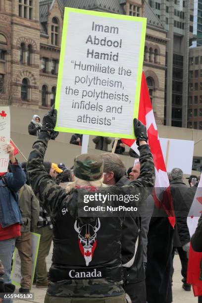 Canadian members of the Soldiers of Odin take part in a demonstration against Islam, Muslims, Sharia Law and M-103 in downtown Toronto, Ontario,...