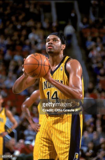 Sam Perkins of the Indiana Pacers makes a free throw during the game against the Seattle SuperSonics at the Key Arena in Seattle, Washington. The...