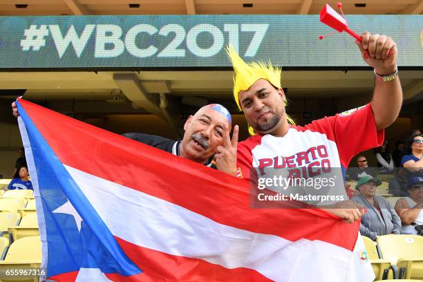 Puerto Rico fan poses for a photo during Game 1 of the Championship Round of the 2017 World Baseball Classic at Dodger Stadium on March 20, 2017 in...