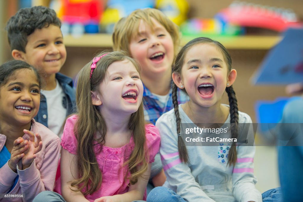 Listening to Their Teacher Read a Story