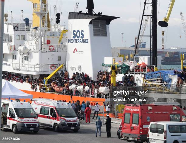 The Aquarius carrying immigrants arrives in the port of Catania, on the island of Sicily on March 21, 2017 after a rescue operation in the...