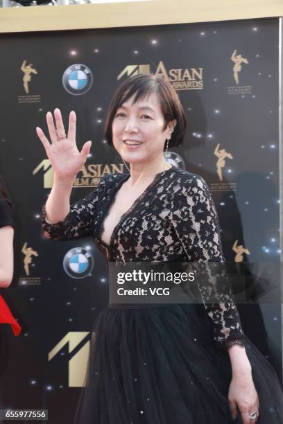 Japanese actress Kaori Momoi arrives at the red carpet of the 11th Asian Film Awards at Hong Kong Cultural Centre on March 21, 2017 in Hong Kong,...