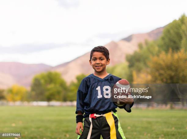 young male flag football player - flag football stock pictures, royalty-free photos & images
