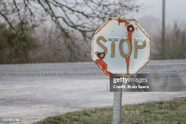 Stop Sign Damage Damaged Stop Sign Photos and Premium High Res Pictures - Getty Images