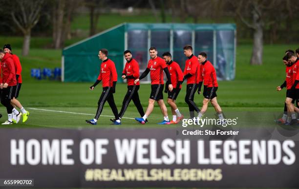 Wales strikers Hal Robson Kanu and Sam Vokes make thie way to training with team mates during a Wales Open Training session ahead of their World Cup...