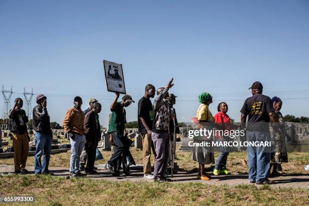 Pan African Congress activists commemorate the Sharpeville massacre anniversary at the Phelandaba in Sharpeville in the Transvaal on March 21, 2017....