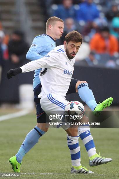 March 18: Hernan Bernardello of Montreal Impact is challenged by Alexander Ring of New York City FC during the New York City FC Vs Montreal Impact...