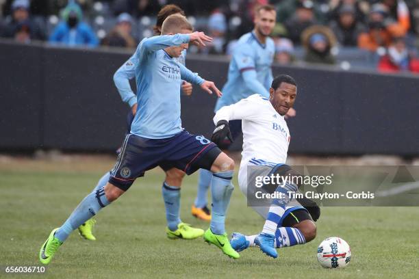 March 18: Patrice Bernier of Montreal Impact is challenged by Alexander Ring of New York City FC during the New York City FC Vs Montreal Impact...