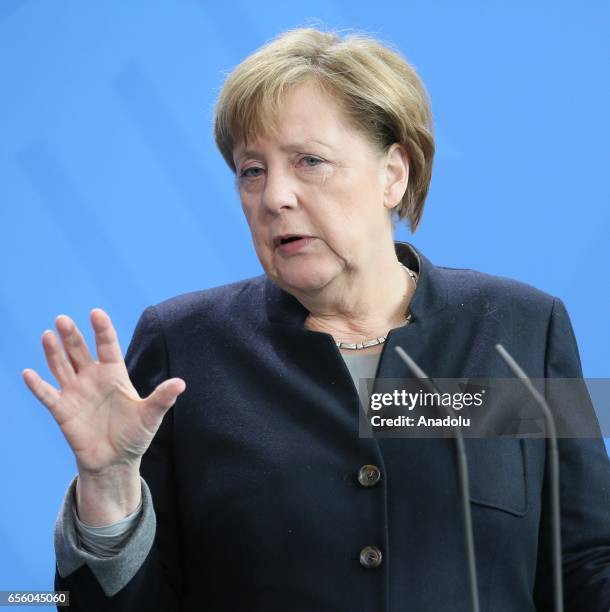German Chancellor Angela Merkel delivers a speech during a joint press conference with the President of Burkina Faso, Roch Marc Christian Kabore...