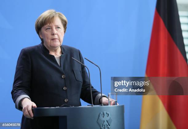 German Chancellor Angela Merkel delivers a speech during a joint press conference with the President of Burkina Faso, Roch Marc Christian Kabore...
