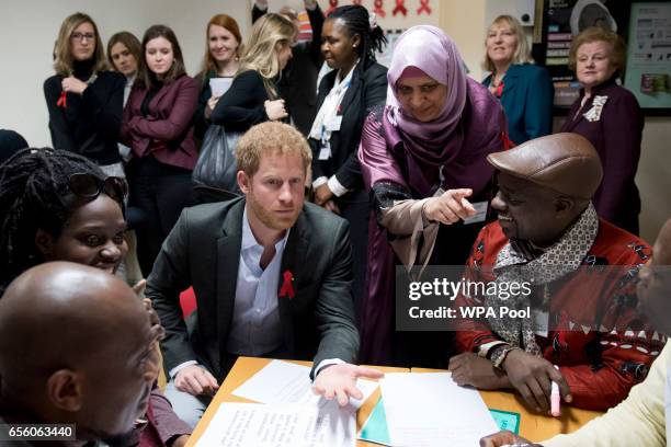 Prince Harry sits down to speak with staff volunteers and associated partners on a training course at the Leicestershire Aids Support Service on...