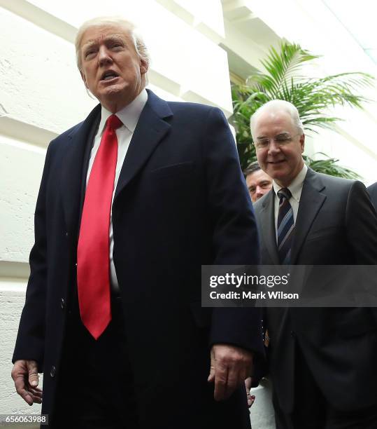 President Donald Trump and HHS Secretary Tom Price leave a House Republican closed party conference on Capitol Hill, on March 21, 2017 in Washington,...