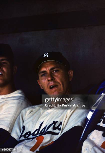 Gil Hodges of the Brooklyn Dodgers sits in the dugout during an MLB Spring Training game against the Boston Red Sox circa March, 1956 in Florida.