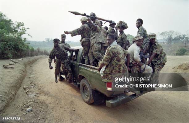 Sierra Leone's Regular army soldiers patrol in the Sierra Rutile on March 23, 1995. The oppositional rebel Revolutionary United Front is fighting the...